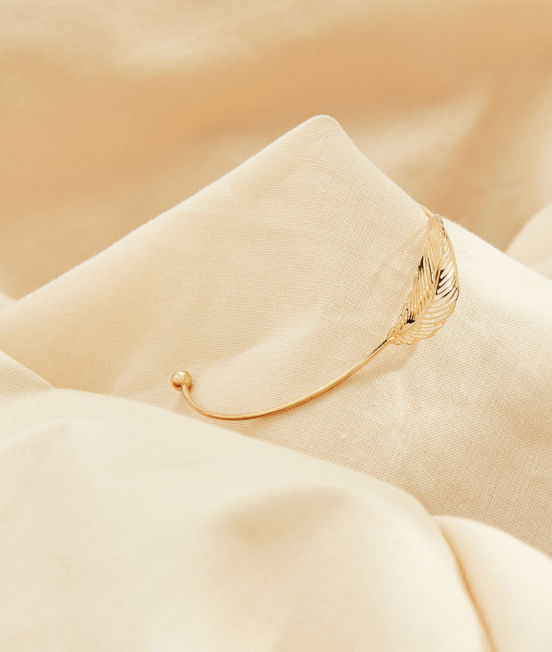 Petite manchette femme feuille AUCUNE